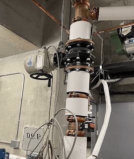 Eddy zone shutoff on a stacked domestic riser
